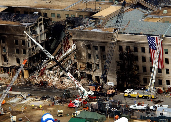 Image of an Aerial view of the destruction at the Pentagon caused by a hijacked commercial jet that crashed into the side of the building during the Sept. 11, 2001, terror attacks. (DOD photo by Air Force Tech. Sgt. Cedric H. Rudisill).