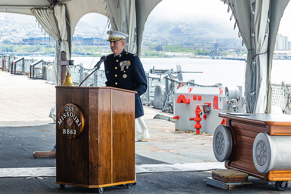 Image of Air Force Lt. Gen. Robert J. Skinner, Defense Information Systems Agency director and Joint Force Headquarters-Department of Defense Information Network commander, Marine Corps Col. Matthew R. Simmons, outgoing DISA Pacific Command commander, and Marine Corps Col. Jared C. Voneida, incoming DISA Pacific Command commander, stand at attention as the change of command ceremony begins on July 15 aboard USS Missouri at Ford Island, Hawaii. Photo by Parish M. Kaleiwahea, DISA/Released.