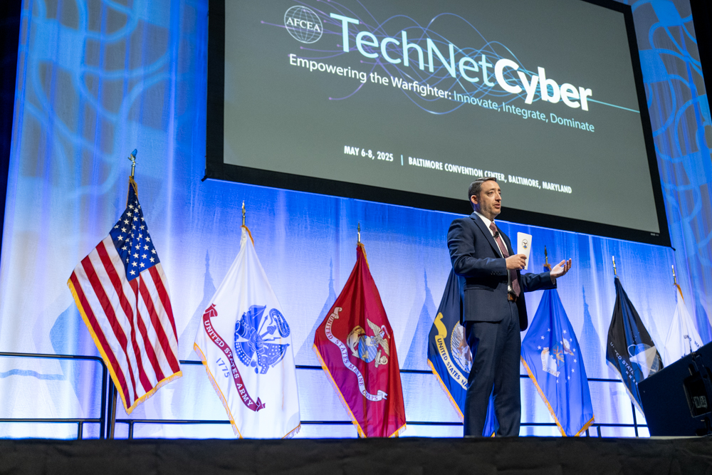 Photo  of Mr. Barnhurst speaking on stage at TechNet Cyber 2025.